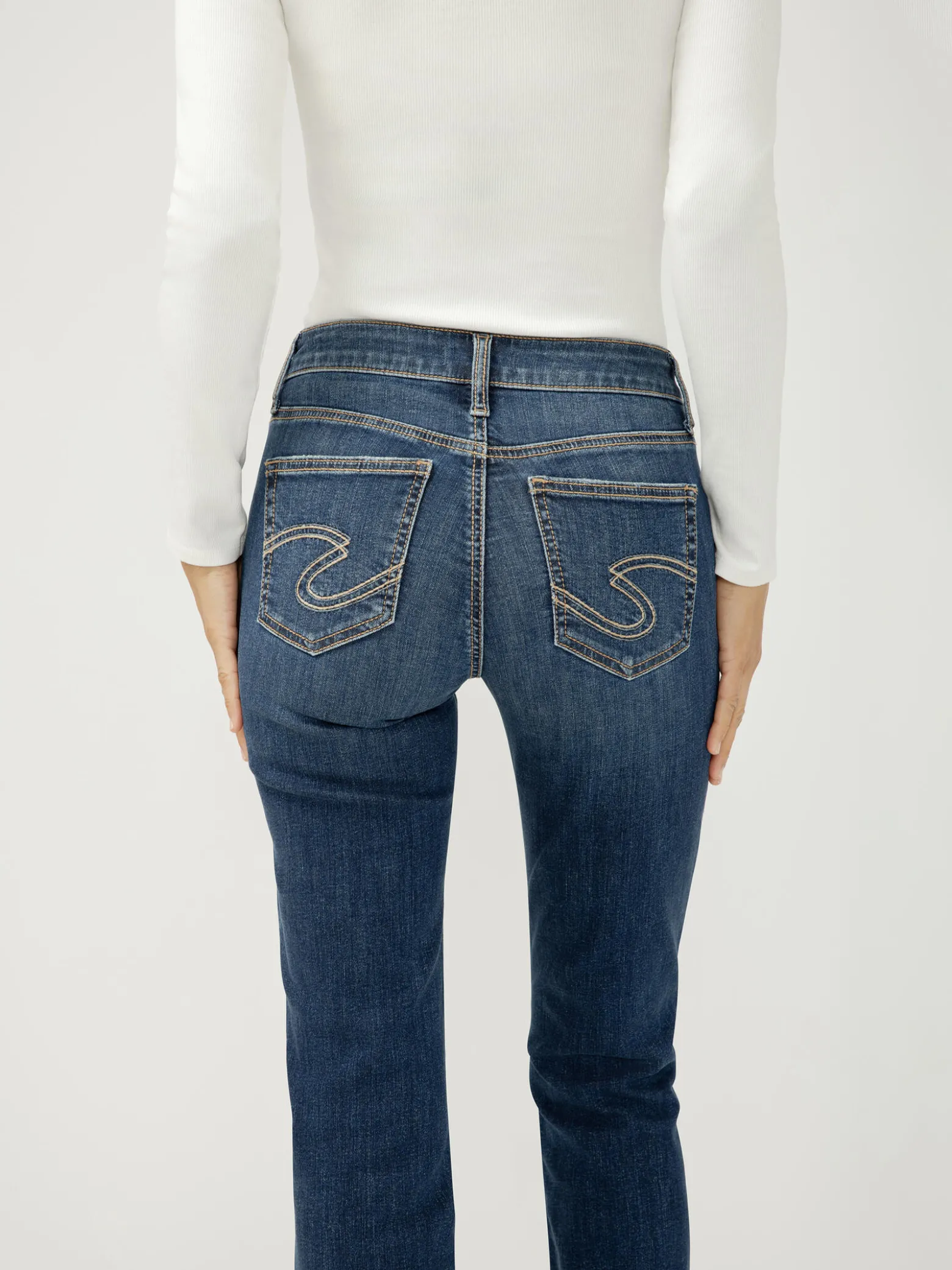 Suki Mid Rise Bootcut Jeans