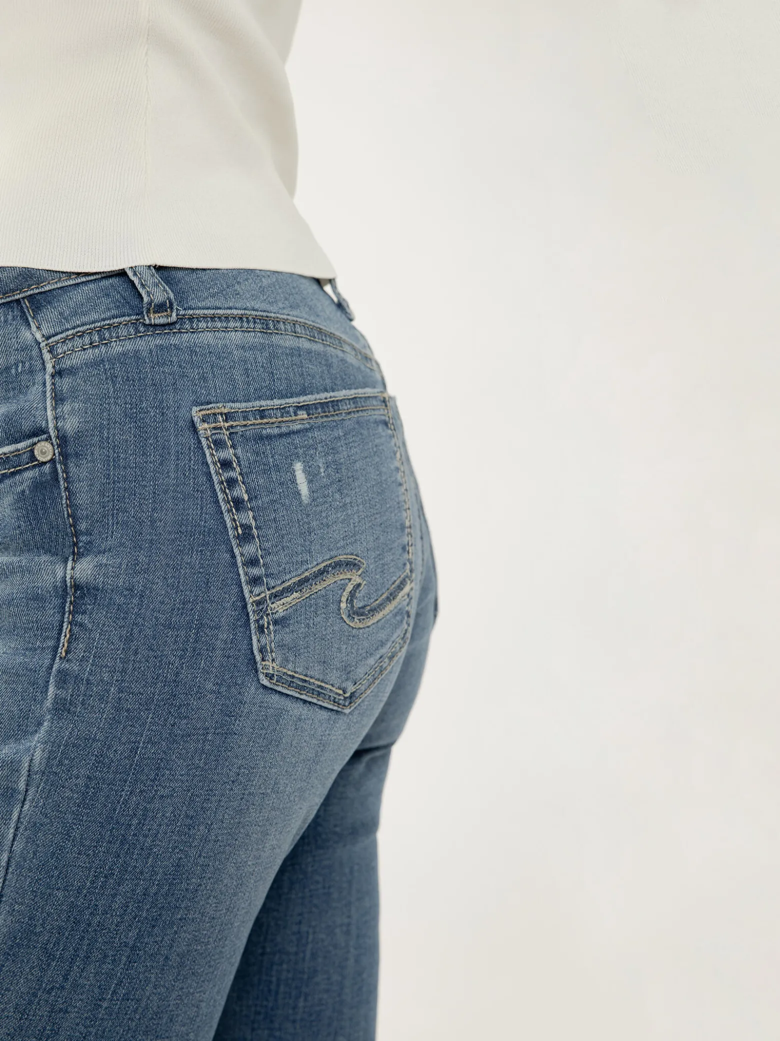 Suki Mid Rise Slim Bootcut Jeans